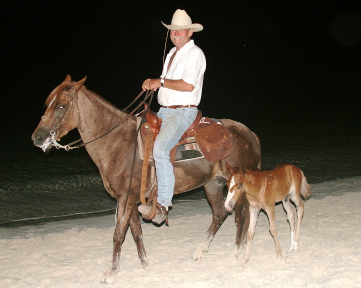 This man from a rival stable tries to drum up business by bringing the baby along for a ride in front of our hotel