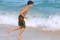 Danny running on the beach
