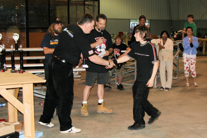 Dan receives the second place middleweight trophy