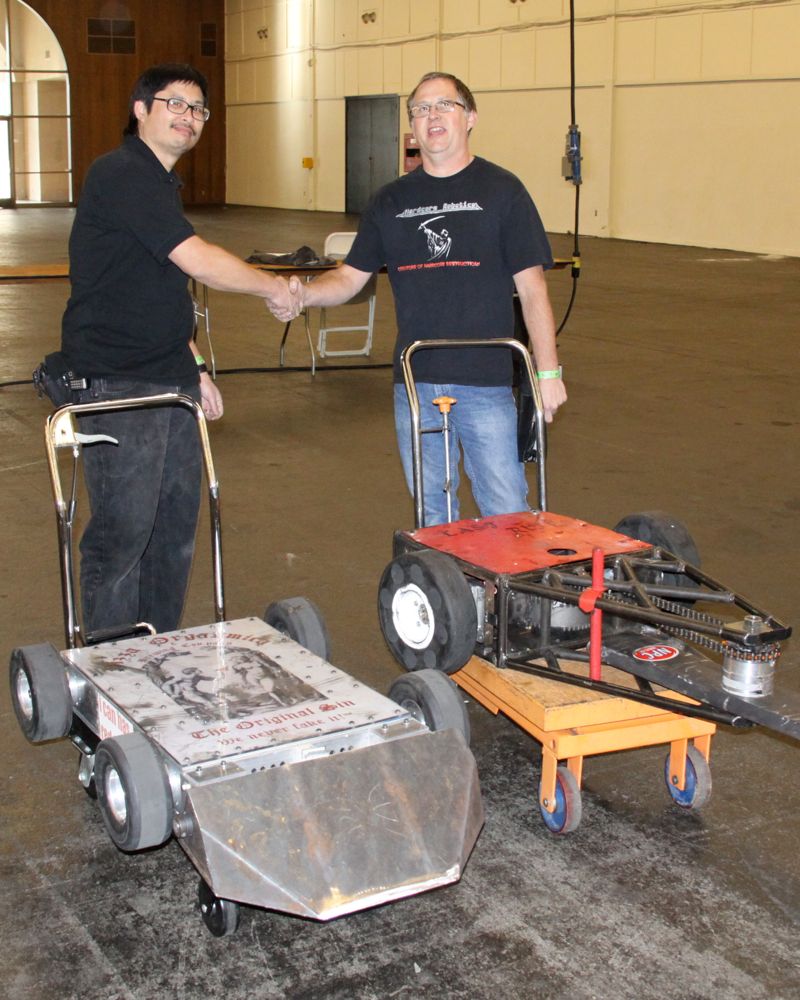 Gary and Ray shake hands