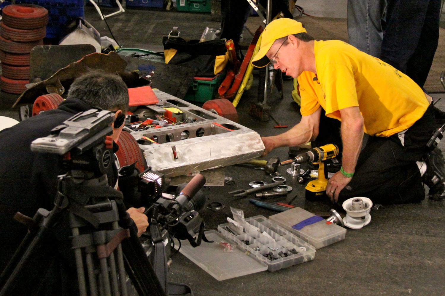 Matt repairs Sewer Snake while the TV camera rolls
