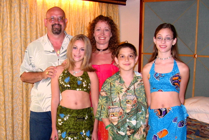 Family dressed for Caribbean Night