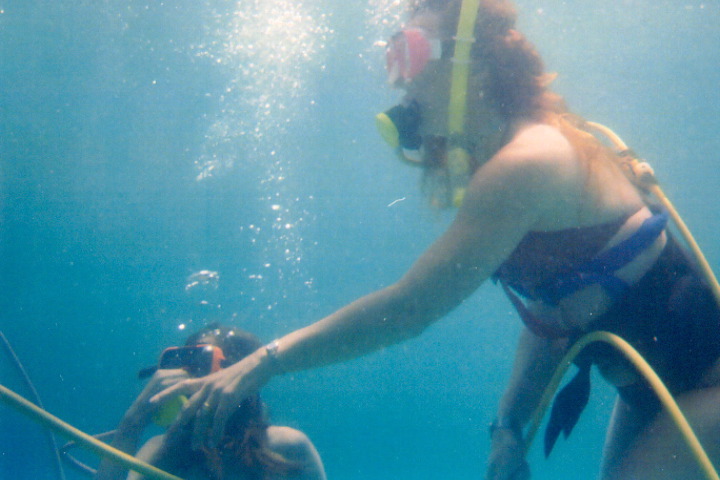 Kelsey and Danny underwater