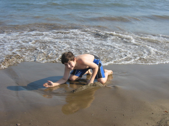 Danny plays in the sand
